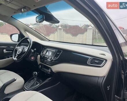 Черный Киа Каренс, объемом двигателя 1.69 л и пробегом 179 тыс. км за 10950 $, фото 93 на Automoto.ua