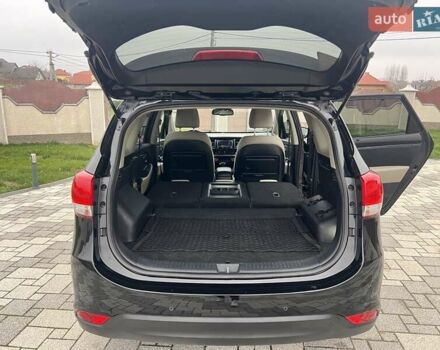 Черный Киа Каренс, объемом двигателя 1.69 л и пробегом 179 тыс. км за 10950 $, фото 141 на Automoto.ua