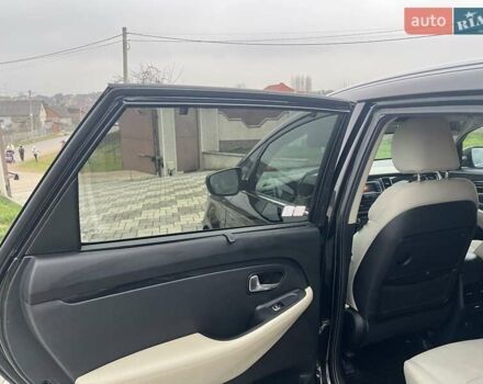 Черный Киа Каренс, объемом двигателя 1.69 л и пробегом 179 тыс. км за 10950 $, фото 75 на Automoto.ua