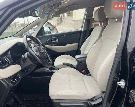 Черный Киа Каренс, объемом двигателя 1.69 л и пробегом 179 тыс. км за 10950 $, фото 68 на Automoto.ua