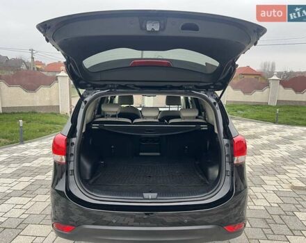 Черный Киа Каренс, объемом двигателя 1.69 л и пробегом 179 тыс. км за 10950 $, фото 108 на Automoto.ua