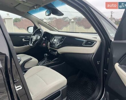 Черный Киа Каренс, объемом двигателя 1.69 л и пробегом 179 тыс. км за 10950 $, фото 91 на Automoto.ua