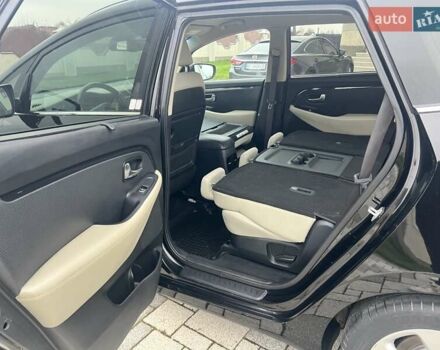 Черный Киа Каренс, объемом двигателя 1.69 л и пробегом 179 тыс. км за 10950 $, фото 151 на Automoto.ua