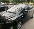 Черный Киа Каренс, объемом двигателя 1.69 л и пробегом 272 тыс. км за 10900 $, фото 1 на Automoto.ua