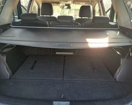 Черный Киа Каренс, объемом двигателя 1.69 л и пробегом 220 тыс. км за 12800 $, фото 2 на Automoto.ua