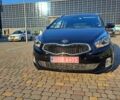 Черный Киа Каренс, объемом двигателя 1.69 л и пробегом 220 тыс. км за 12800 $, фото 1 на Automoto.ua