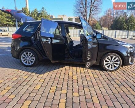 Черный Киа Каренс, объемом двигателя 1.69 л и пробегом 220 тыс. км за 12800 $, фото 10 на Automoto.ua