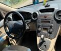 Черный Киа Каренс, объемом двигателя 2 л и пробегом 235 тыс. км за 5600 $, фото 4 на Automoto.ua