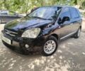 Черный Киа Каренс, объемом двигателя 2 л и пробегом 301 тыс. км за 7000 $, фото 1 на Automoto.ua