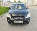 Чорний Кіа Каренс, об'ємом двигуна 2 л та пробігом 227 тис. км за 5998 $, фото 1 на Automoto.ua