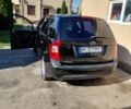 Черный Киа Каренс, объемом двигателя 2 л и пробегом 265 тыс. км за 5500 $, фото 6 на Automoto.ua