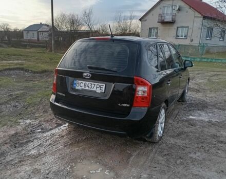 Черный Киа Каренс, объемом двигателя 2 л и пробегом 349 тыс. км за 5800 $, фото 2 на Automoto.ua