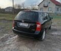 Черный Киа Каренс, объемом двигателя 2 л и пробегом 349 тыс. км за 6000 $, фото 2 на Automoto.ua