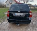 Черный Киа Каренс, объемом двигателя 2 л и пробегом 349 тыс. км за 6000 $, фото 7 на Automoto.ua