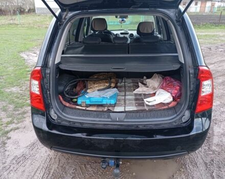 Черный Киа Каренс, объемом двигателя 2 л и пробегом 349 тыс. км за 6000 $, фото 8 на Automoto.ua