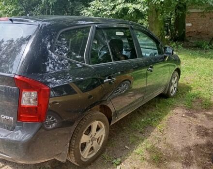 Черный Киа Каренс, объемом двигателя 2 л и пробегом 349 тыс. км за 6000 $, фото 12 на Automoto.ua