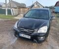 Чорний Кіа Каренс, об'ємом двигуна 2 л та пробігом 349 тис. км за 5200 $, фото 1 на Automoto.ua