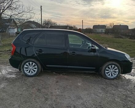 Черный Киа Каренс, объемом двигателя 2 л и пробегом 349 тыс. км за 6000 $, фото 3 на Automoto.ua