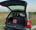 Черный Киа Каренс, объемом двигателя 2 л и пробегом 142 тыс. км за 8700 $, фото 4 на Automoto.ua