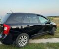 Черный Киа Каренс, объемом двигателя 2 л и пробегом 142 тыс. км за 8700 $, фото 2 на Automoto.ua