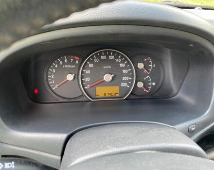 Черный Киа Каренс, объемом двигателя 2 л и пробегом 68 тыс. км за 9000 $, фото 1 на Automoto.ua