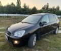 Черный Киа Каренс, объемом двигателя 2 л и пробегом 142 тыс. км за 8700 $, фото 1 на Automoto.ua