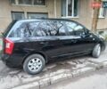 Черный Киа Каренс, объемом двигателя 2 л и пробегом 269 тыс. км за 4100 $, фото 1 на Automoto.ua