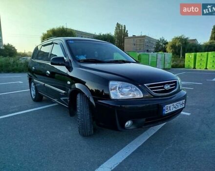 Черный Киа Каренс, объемом двигателя 1.98 л и пробегом 237 тыс. км за 5700 $, фото 1 на Automoto.ua