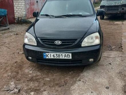 Черный Киа Каренс, объемом двигателя 2 л и пробегом 190 тыс. км за 4499 $, фото 1 на Automoto.ua
