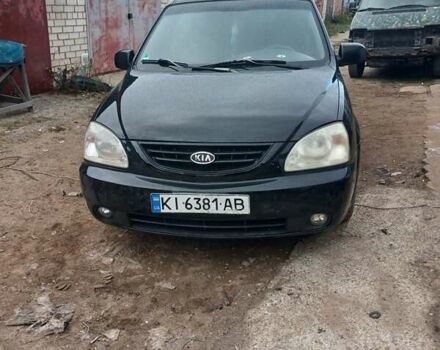 Черный Киа Каренс, объемом двигателя 2 л и пробегом 190 тыс. км за 4499 $, фото 1 на Automoto.ua