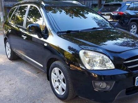 Чорний Кіа Каренс, об'ємом двигуна 2 л та пробігом 296 тис. км за 5300 $, фото 1 на Automoto.ua
