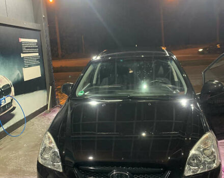 Чорний Кіа Каренс, об'ємом двигуна 2 л та пробігом 199 тис. км за 6400 $, фото 1 на Automoto.ua