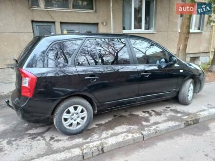 Черный Киа Каренс, объемом двигателя 2 л и пробегом 269 тыс. км за 4100 $, фото 1 на Automoto.ua
