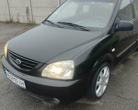 Черный Киа Каренс, объемом двигателя 1.98 л и пробегом 291 тыс. км за 4600 $, фото 1 на Automoto.ua