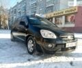 Чорний Кіа Каренс, об'ємом двигуна 2 л та пробігом 167 тис. км за 7200 $, фото 1 на Automoto.ua