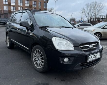 Черный Киа Каренс, объемом двигателя 2 л и пробегом 250 тыс. км за 5600 $, фото 1 на Automoto.ua