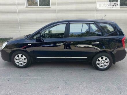 Кіа Каренс 2007 у Києві на Automoto.ua Чорний Кіа Каренс, об'ємом двигуна 1.99 л та пробігом 281 тис. км за 5500 $, фото 1 на Automoto.ua