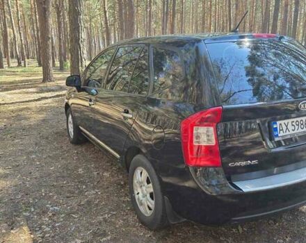 Черный Киа Каренс, объемом двигателя 2 л и пробегом 195 тыс. км за 5700 $, фото 1 на Automoto.ua