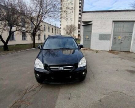 Черный Киа Каренс, объемом двигателя 2 л и пробегом 260 тыс. км за 5800 $, фото 1 на Automoto.ua