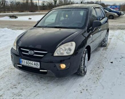 Черный Киа Каренс, объемом двигателя 2 л и пробегом 276 тыс. км за 5500 $, фото 1 на Automoto.ua
