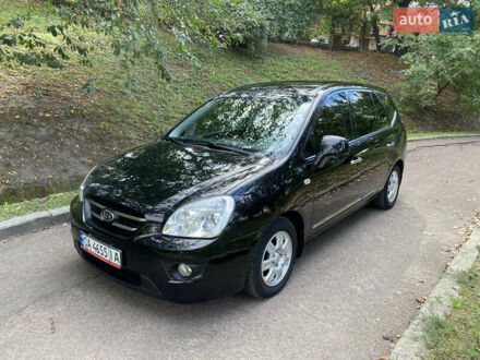 Чорний Кіа Каренс, об'ємом двигуна 2 л та пробігом 150 тис. км за 6650 $, фото 1 на Automoto.ua