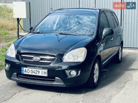 Чорний Кіа Каренс, об'ємом двигуна 2 л та пробігом 235 тис. км за 4600 $, фото 1 на Automoto.ua