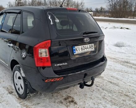 Черный Киа Каренс, объемом двигателя 2 л и пробегом 276 тыс. км за 5500 $, фото 1 на Automoto.ua