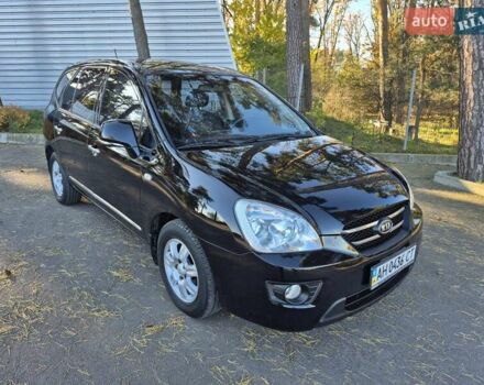Чорний Кіа Каренс, об'ємом двигуна 2 л та пробігом 88 тис. км за 6450 $, фото 1 на Automoto.ua
