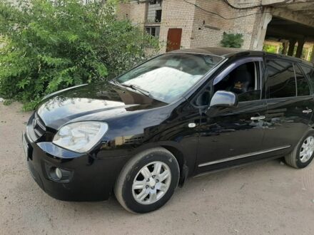 Черный Киа Каренс, объемом двигателя 2 л и пробегом 335 тыс. км за 6300 $, фото 1 на Automoto.ua