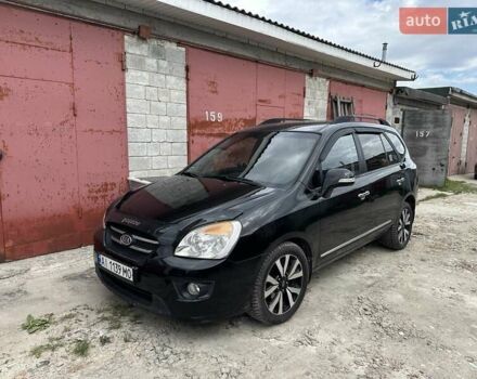 Черный Киа Каренс, объемом двигателя 2 л и пробегом 186 тыс. км за 7300 $, фото 1 на Automoto.ua