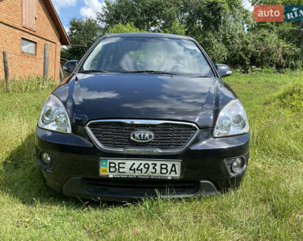 Черный Киа Каренс, объемом двигателя 2 л и пробегом 674 тыс. км за 10000 $, фото 1 на Automoto.ua