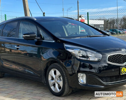 Черный Киа Каренс, объемом двигателя 1.7 л и пробегом 226 тыс. км за 10000 $, фото 1 на Automoto.ua