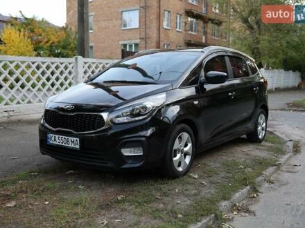 Черный Киа Каренс, объемом двигателя 2 л и пробегом 191 тыс. км за 12500 $, фото 1 на Automoto.ua