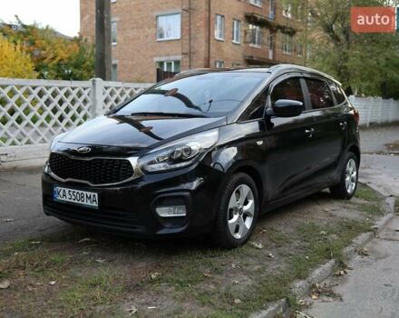 Черный Киа Каренс, объемом двигателя 2 л и пробегом 191 тыс. км за 12500 $, фото 1 на Automoto.ua